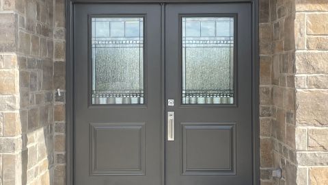 Insulated exterior metal door with weather-stripping. 