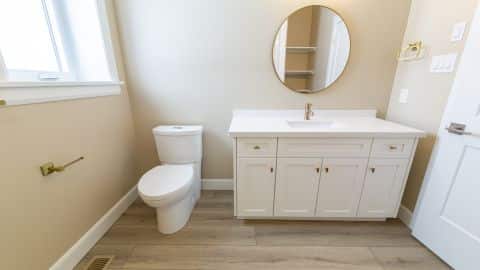 Vanities with sink and mirrors in all bathrooms.
